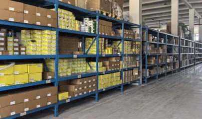 Organized shelves of spray equipment components in the Taizhou warehouse